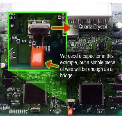 Shorting the clock crystal with a capacitor